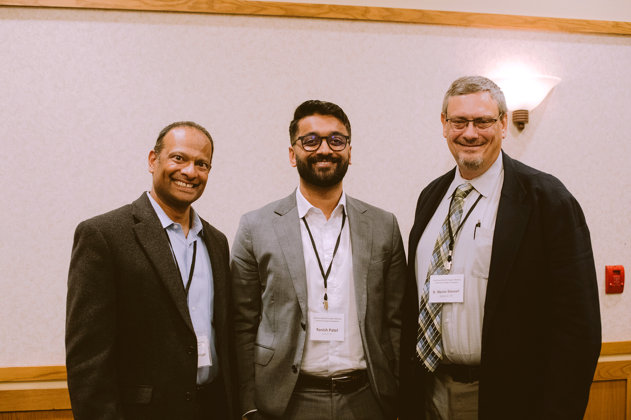 Surgeons connecting at a chapter meeting Surgeons connecting at a chapter meeting